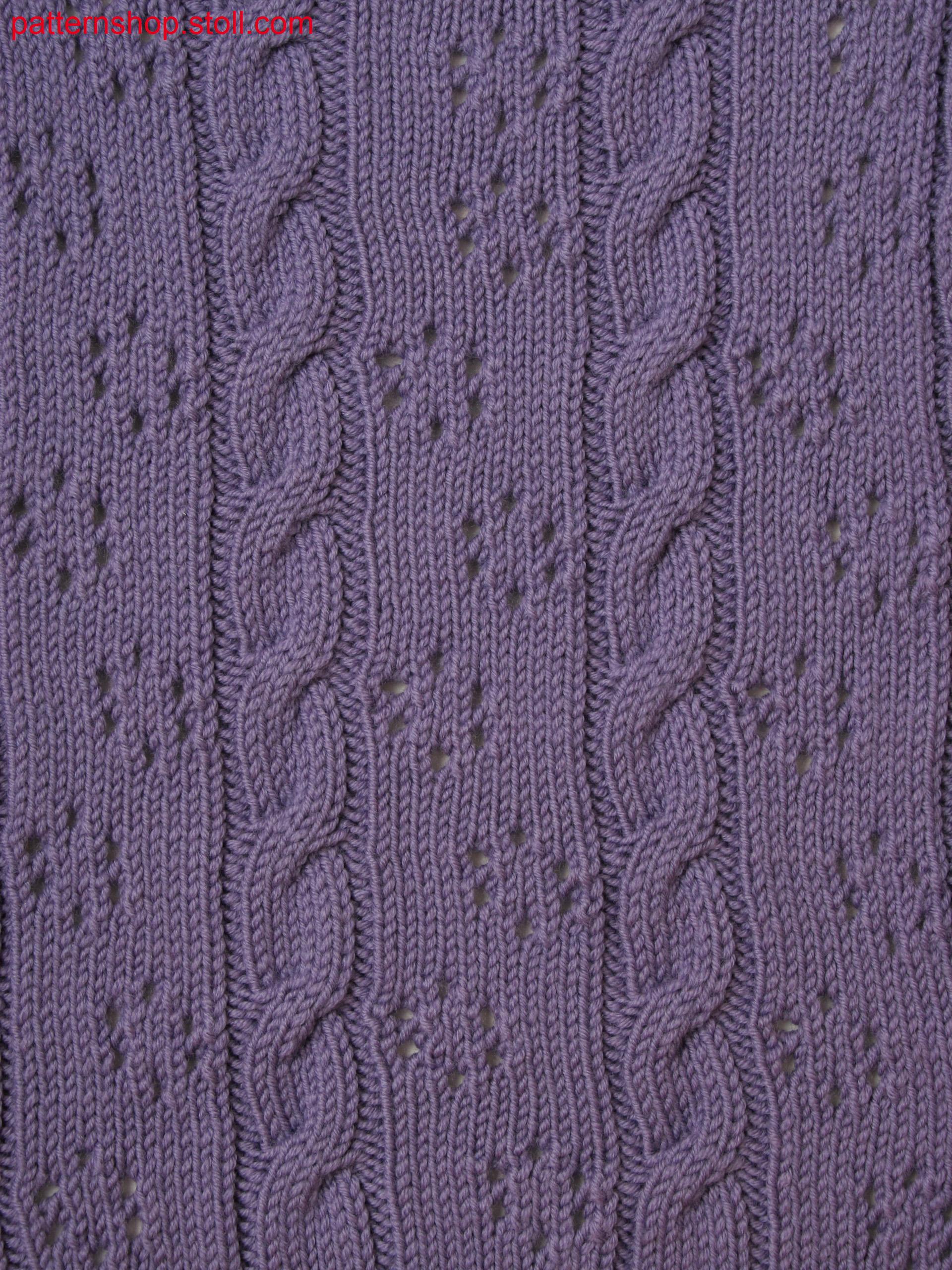 Knitted fabric with cables and pointelle