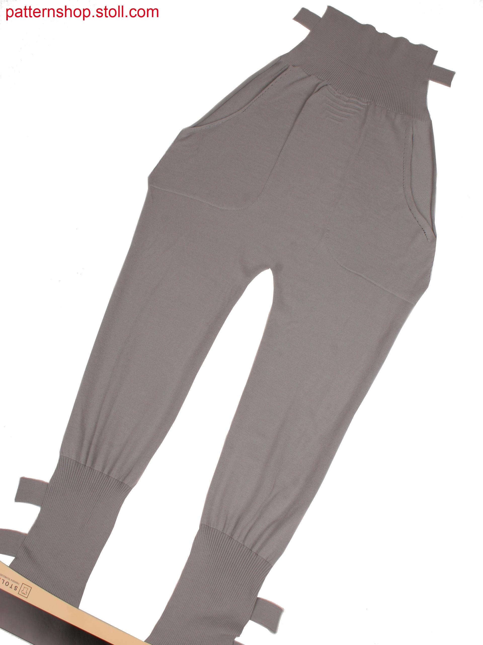 Trousers with bonded outer side seams, slit pockets and side knitted on ankle straps